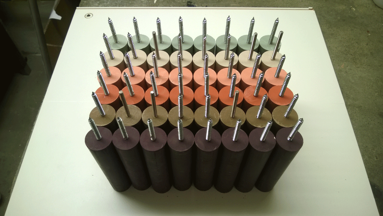 Jesmonite wall hooks in multiple colors in production